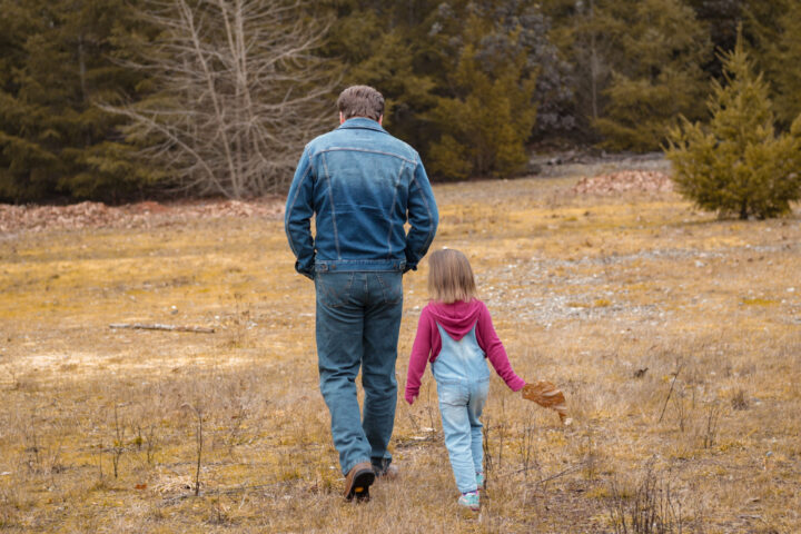 Dad walking with daughter